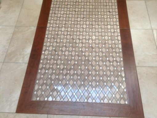 Wood framed mosiac tile floor